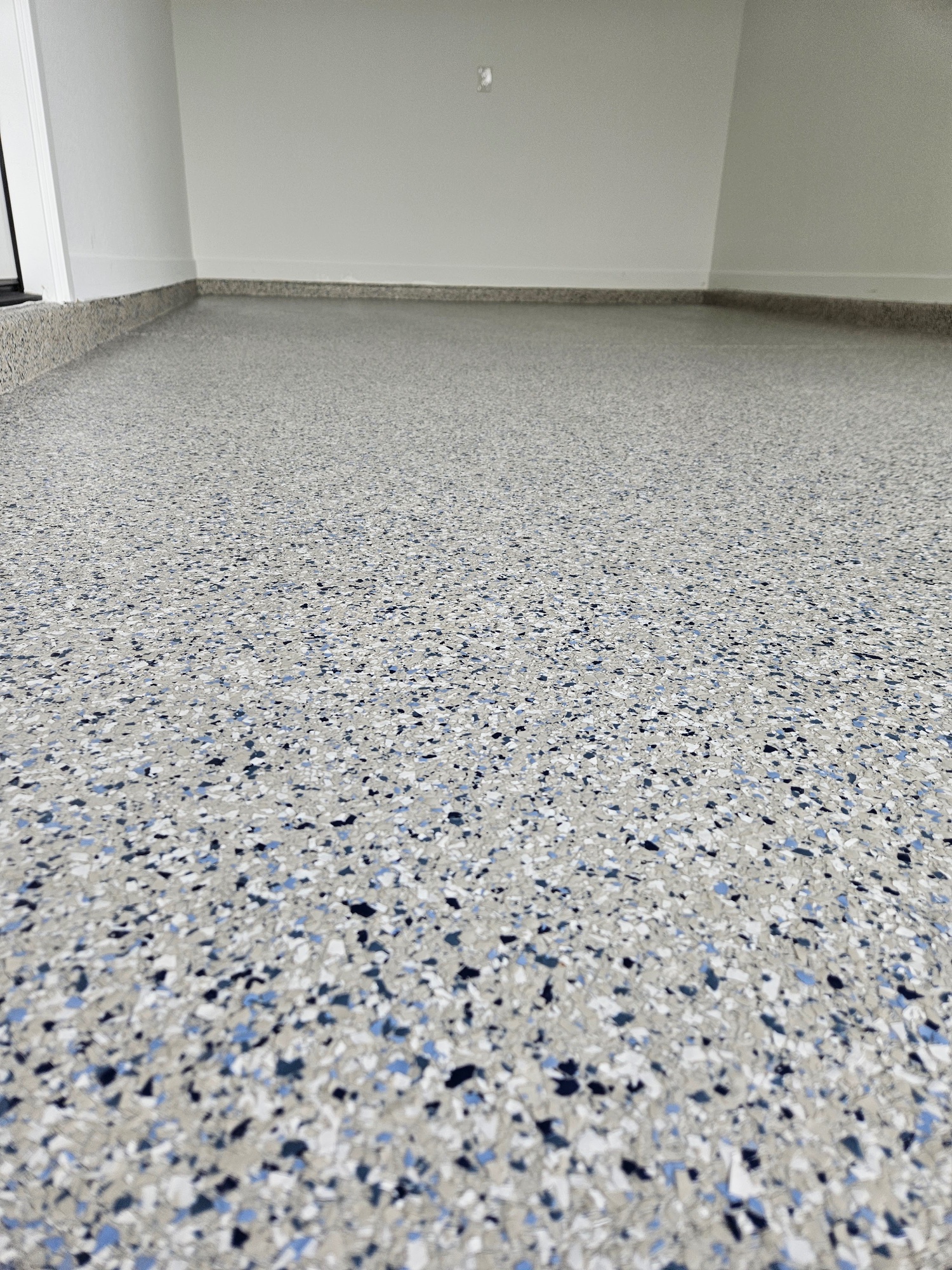Blue grey white flake epoxy floor closeup Arizona
