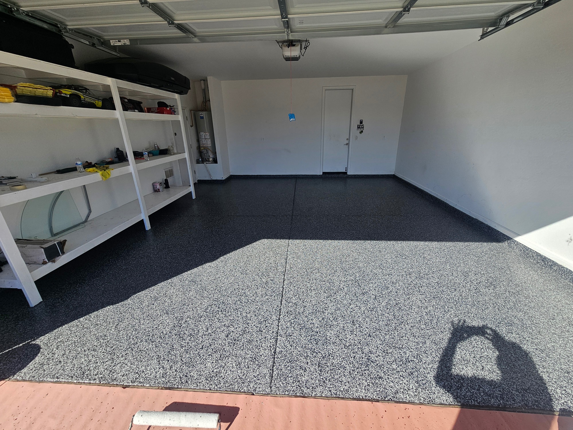 Epoxy flake garage floor with shelving Arizona